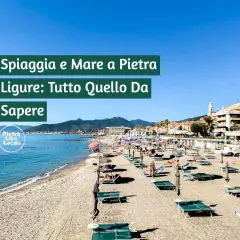 Spiagge di sabbia in Liguria, con lettini e ombrelloni pronti per accogliere i bagnanti. Il mare azzurro e la costa animata invitano al relax.