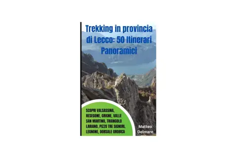 Copertina libro "Trekking in provincia di Lecco: 50 Itinerari Panoramici". Paesaggio mozzafiato delle montagne lecchesi con lago sullo sfondo.