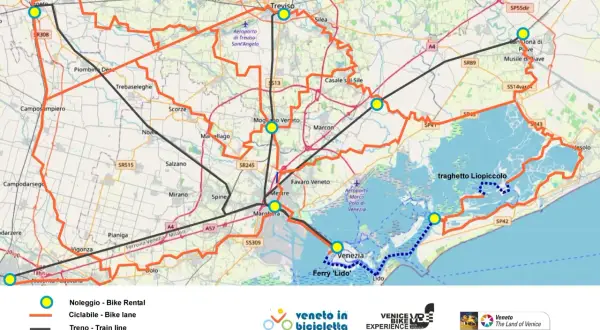 Mappa della ciclabile del Sile, con percorsi ciclabili arancioni, linee ferroviarie nere e punti di noleggio bici gialli. Include Venezia e la laguna.