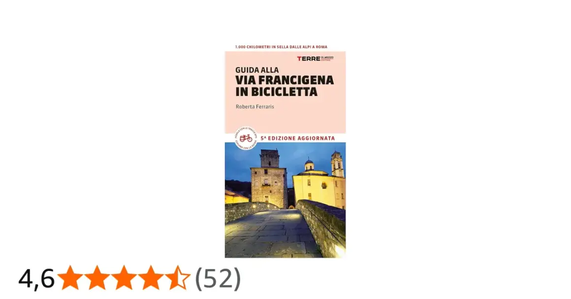 Guida alla Via Francigena in bici, un percorso di 1.000 km dalle Alpi a Roma. Immagine di un ponte medievale illuminato.