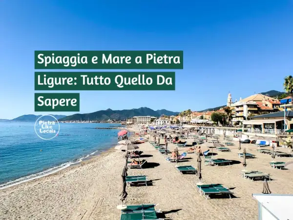 Spiagge di sabbia in Liguria, con lettini e ombrelloni pronti per accogliere i bagnanti. Il mare azzurro e la costa animata invitano al relax.